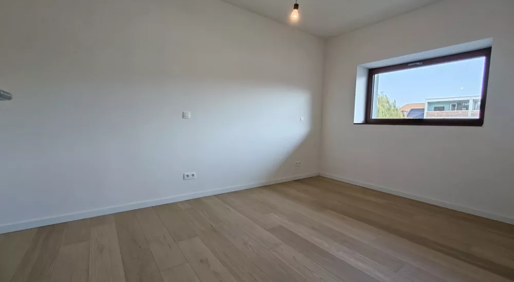 Nieuwappartement met open zicht te Veldegem