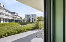 Ruim gelijkvloers 2‑slpk appartement (97 m²) met berging, autostaanplaats en terras van 33 m² — Sint‑Michiels